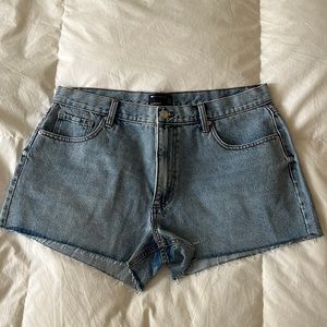Never before worn ASOS jean shorts. Size 10, runs large.